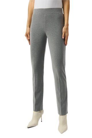 Gray pants worn by a person on a white background