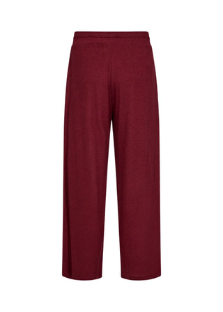 Maroon pants on a white background