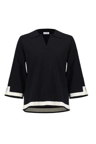 Black blouse with white trim on a white background