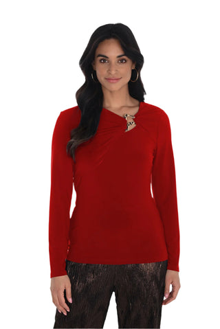 Woman wearing a red long-sleeve top on a white background