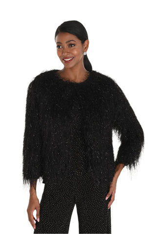 Woman wearing a black, textured sweater on a white background