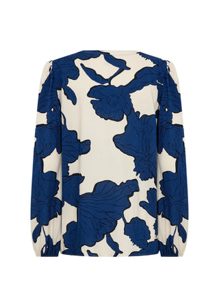 Blue floral patterned blouse on a white background