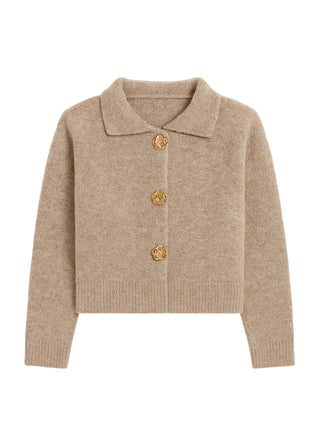 Beige sweater with gold buttons on a white background