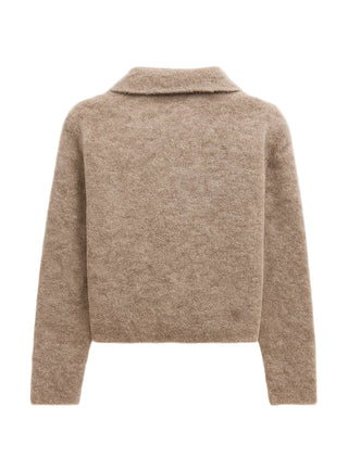 Brown sweater on a white background