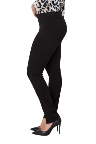 Black pants worn by a person on a white background