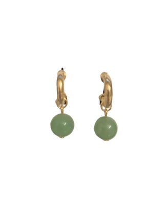 Gold hoop earrings with green beads on a Merx branded card against a black background