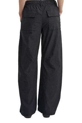Black cargo pants on a white background