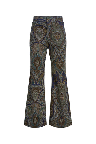 A pair of wide-leg trousers featuring an intricate paisley and medallion pattern in navy blue, brown, beige, and muted gold, displayed against a solid off-white background.