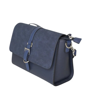 A navy blue faux-leather shoulder bag with a top handle, a front flap featuring a buckle strap, and a zippered side pocket, shown on a light gray background.