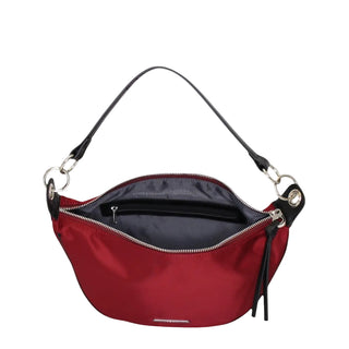 A red nylon crescent-shaped shoulder bag with a black leather strap and silver-tone hardware, shown open against a light gray background.