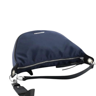 A navy blue nylon shoulder bag with a black adjustable strap and silver-tone hardware, shown against a light gray background.