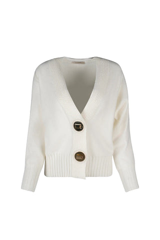 White cardigan with gold buttons on a white background