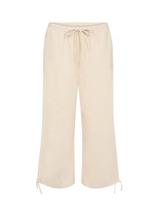 Beige wide-leg pants with drawstring waist on a white background