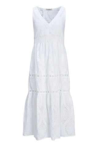 White sleeveless dress with lace details on a light blue background