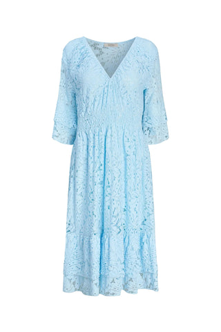 Light blue lace dress on a light blue background