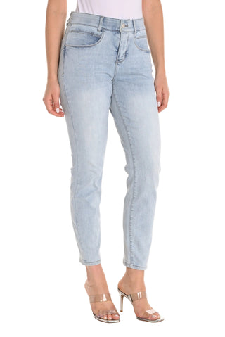 Light blue jeans worn by a person on a white background