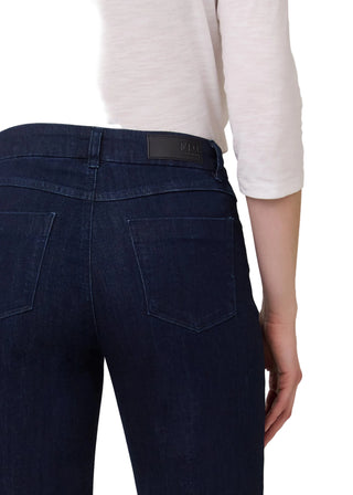 Navy blue pants with a visible brand label on a plain background