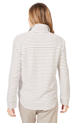 Woman wearing a striped long-sleeve shirt on a white background