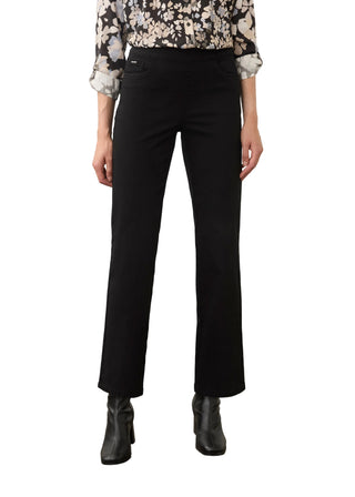 A model is shown from the waist down wearing black wide-leg cropped pants, a black and white floral blouse, and black leather ankle boots, standing against a neutral studio backdrop.