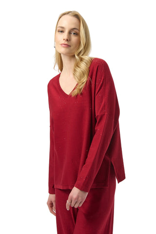 Woman wearing a red outfit on a white background
