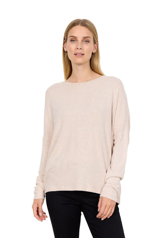 woman wearing light beige shirt