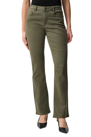 Person wearing olive green pants on a white background