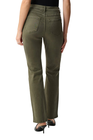 Person wearing olive green pants on a white background