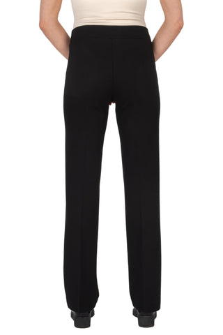 Black pants worn by a person on a white background