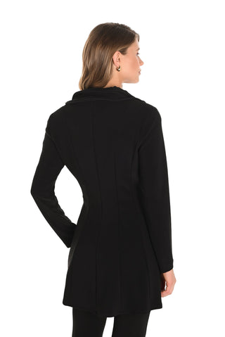 Woman wearing a black coat on a white background