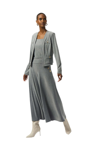 Woman wearing a gray suit with a white background