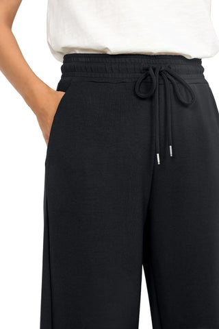 Black wide-leg pants with a drawstring waist on a white background