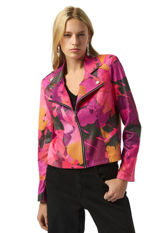 Woman wearing a colorful jacket with abstract patterns on a white background