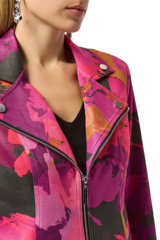 Close-up of a colorful jacket with floral patterns on a plain background