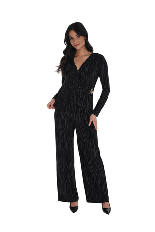 Woman wearing a black patterned jumpsuit on a white background