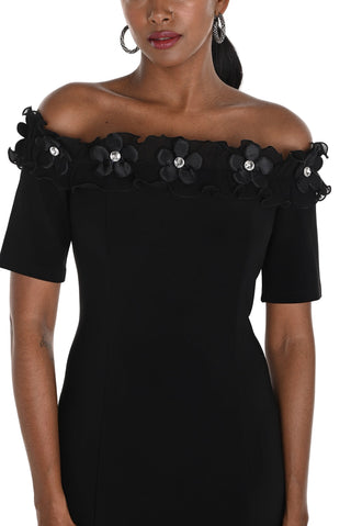 Black off-shoulder dress with floral embellishments on a white background