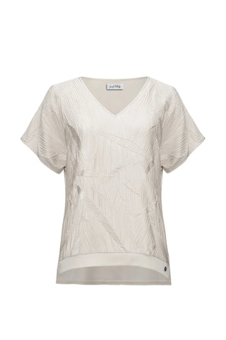 Beige textured blouse on a white background