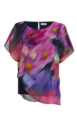 Multicolored floral blouse on a white background