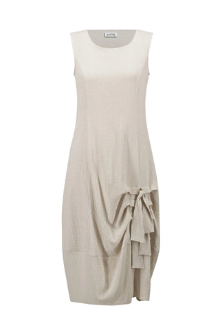 Beige sleeveless dress with ruffled details on a white background