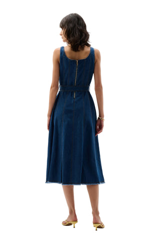 Woman wearing a blue dress on a white background