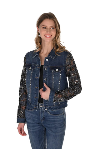Woman wearing a denim jacket with lace sleeves on a white background
