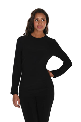 Woman wearing a black long-sleeve top and pants on a white background