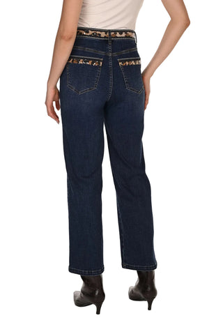Person wearing dark blue jeans on a white background