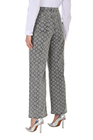 Patterned gray pants worn by a person on a white background
