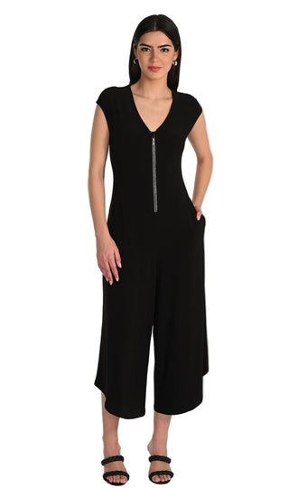Woman wearing a black jumpsuit with 'Frank Lyman Montreal' branding above.