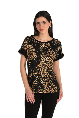 Woman wearing a leopard print top on a white background
