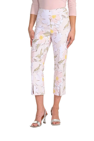 Woman wearing floral pants on a white background