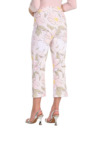 Person wearing floral pants on a plain background