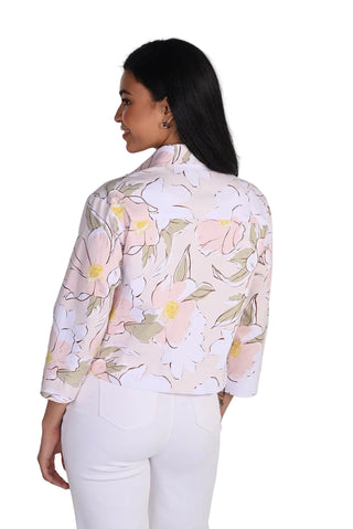 Woman wearing a floral blouse with a white background