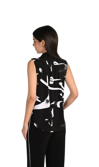 Woman wearing a black sleeveless top with white abstract patterns, standing against a white background with 'Frank Lyman Montreal' branding.