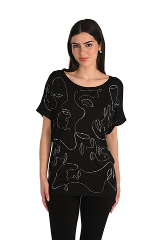 Woman wearing a black t-shirt with abstract white line designs on a white background